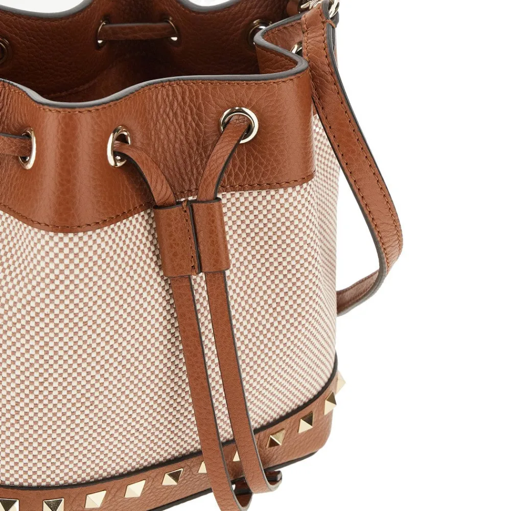 rockstud_canvas_bucket_ba_3.webp Best Rockstud' canvas bucket bag Top-Handle Bags | Crossbody Bags