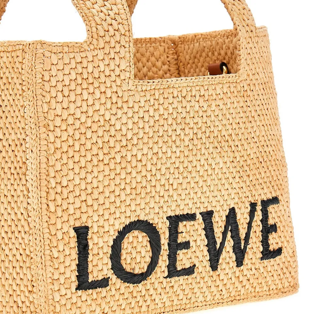 small_raffia_tote_bag_wit_3.webp New Small raffia tote bag with logo Top-Handle Bags | Crossbody Bags