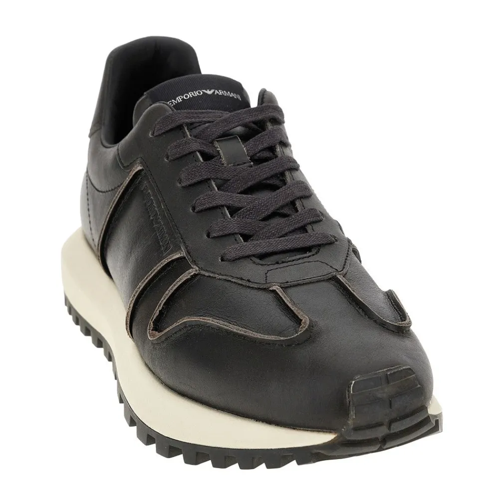 vintageeffect_leather_sne_1.webp Outlet Vintage-effect leather sneakers Sneakers